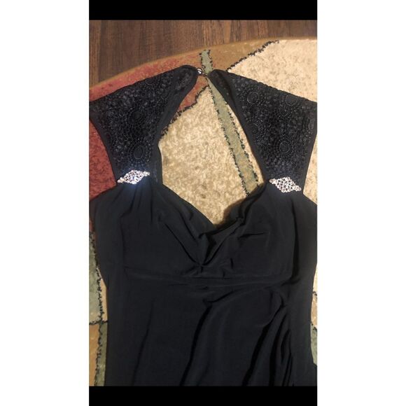 Turn heads with this R & M Richards black cap sleeve beaded gown.Retail $149.00 - Picture 12 of 16